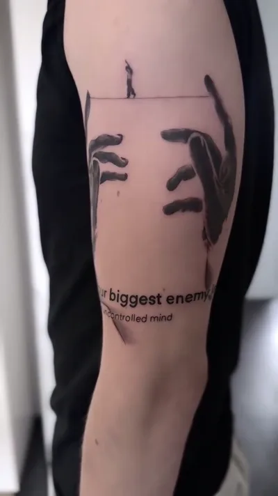 Lettering Tattoo Hamburg - Your biggest enemy Oberarm